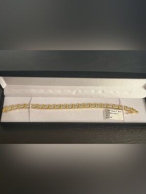 Two-Tone 14k gold plating over brass bracelet with .25 carat real diamonds